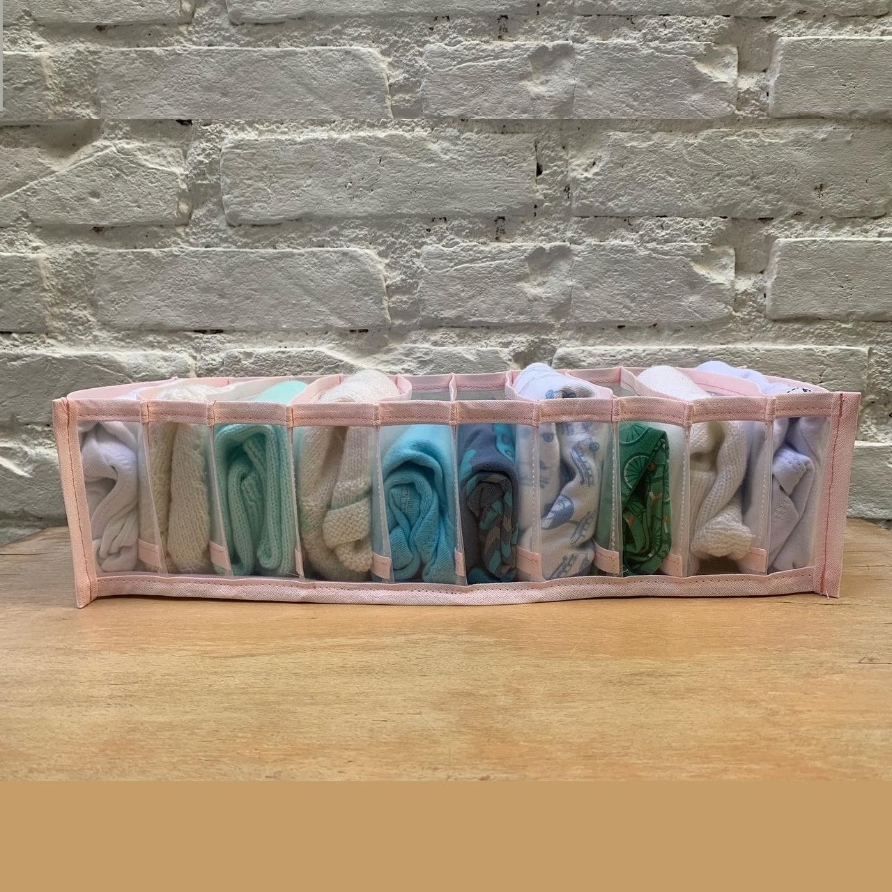 organizador para  roupas de bebe ou roupas intimas. 